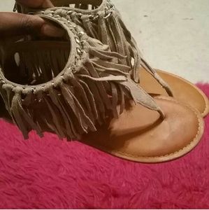 Fringe sandals.