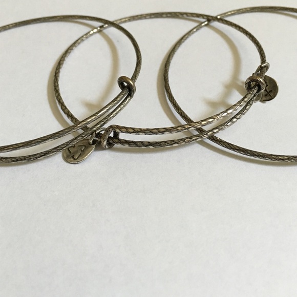 Silver accent Alex and Ani bangles set of 3