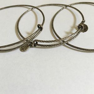 Silver accent Alex and Ani bangles set of 3