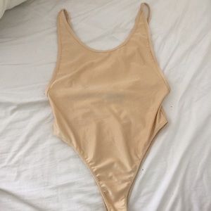 Nude Low-Back One-Piece Bodysuit
