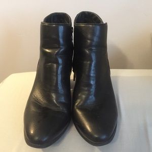 Black high heel booties.