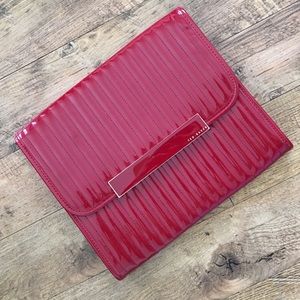 Oversized red patent leather Ted Baker clutch