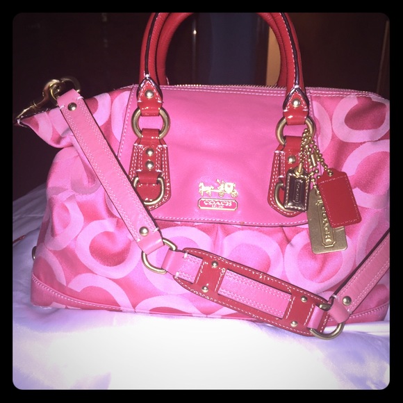 Coach signature OP in salmon pink and gold trim