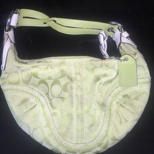 Medium sized coach purse.