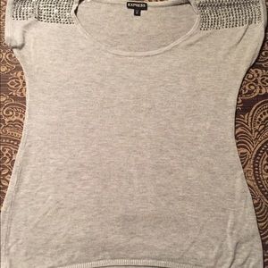 Women's XS sweater studs on shoulders.