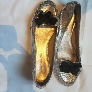 NWOT slip on loafer. Silver snake skin print.