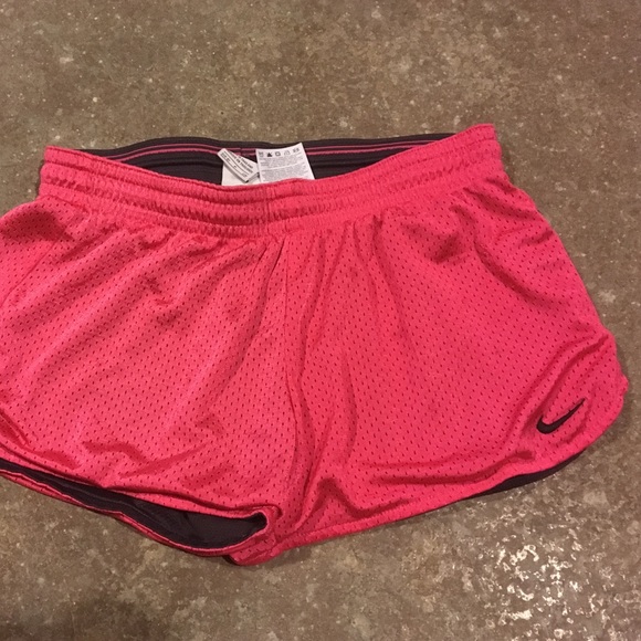 Pink nike running shorts