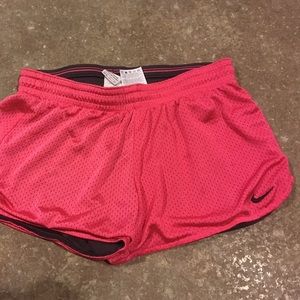 Pink nike running shorts