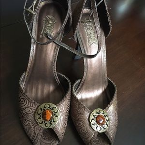 Carlos Santana heels