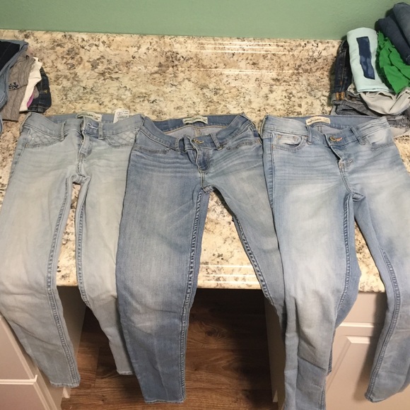 Three pairs of skinny-light wash  12 slim jeans