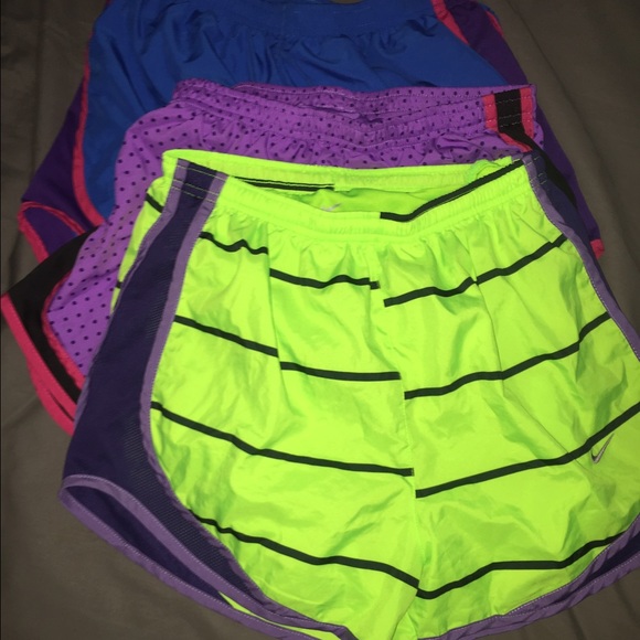 three pairs of medium sized Nike athletic shorts!!