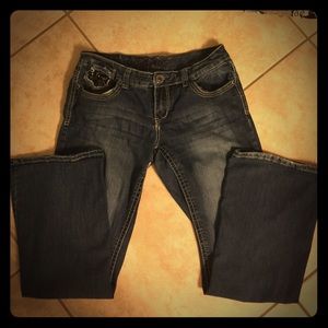Ariya Jeans stretch boot cut. Bling on pockets.