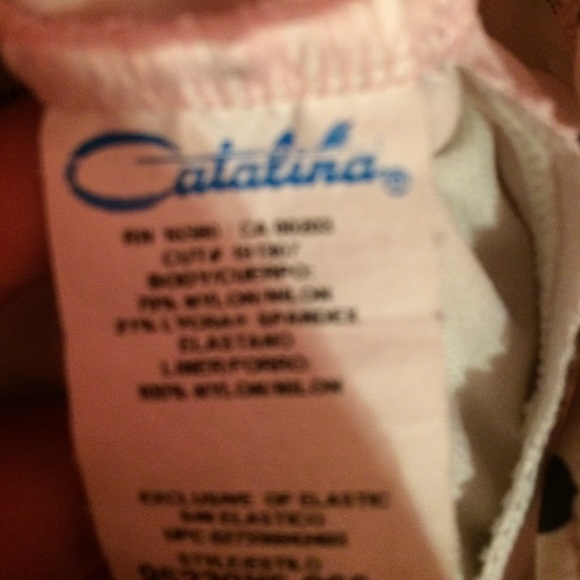 A pink palstsle color shirt with pokofdots - Picture 2 of 3