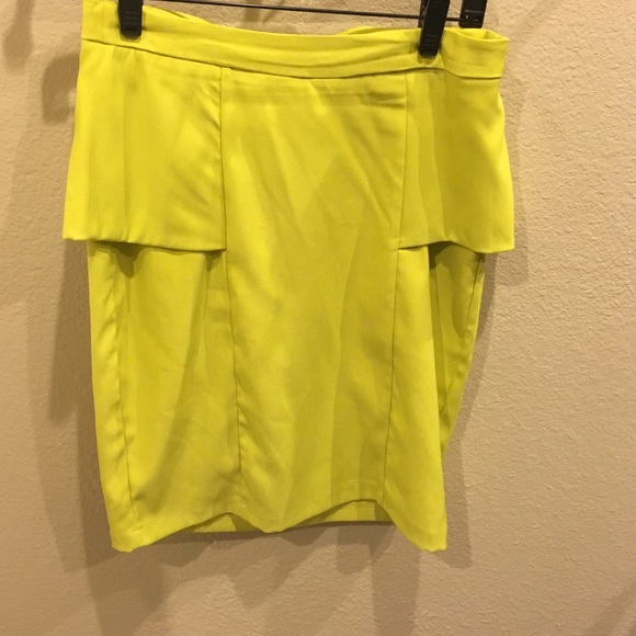 Neon green/yellow mini peplum skirt