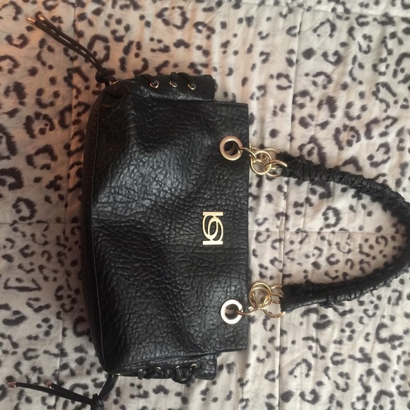 Beautiful bebe shoulder bag.