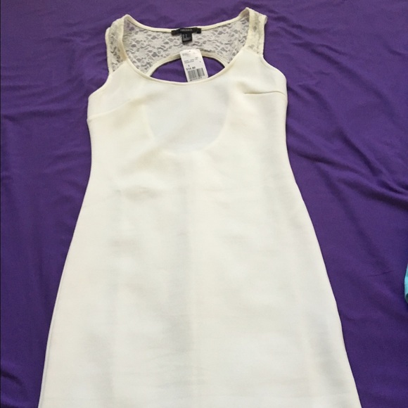 Nwt cream dress with lace details in back