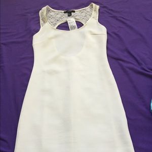 Nwt cream dress with lace details in back
