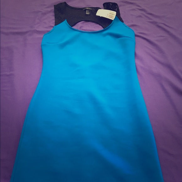 Blue dress with black lace details on back