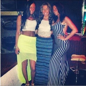 A look at the neon yellow high-low skirt.