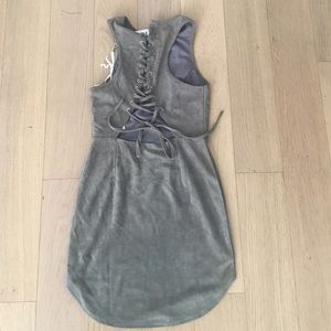 Lace-up grey suede dress.