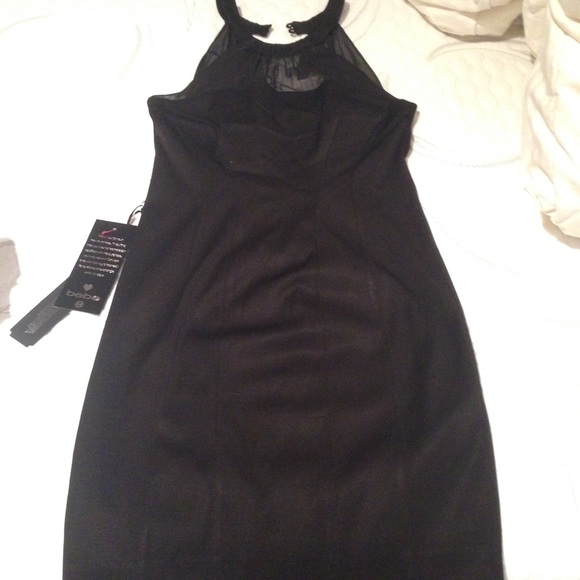 Bebe black dress. Never worn