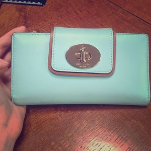 Kate spaid turn lock wallet