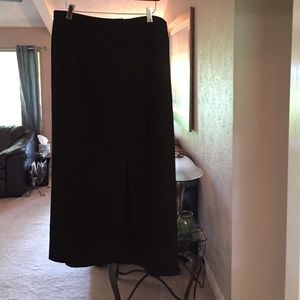 Black straight line front split front zipper maxi.