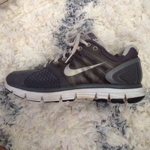 Gray Nike Flywire shoes