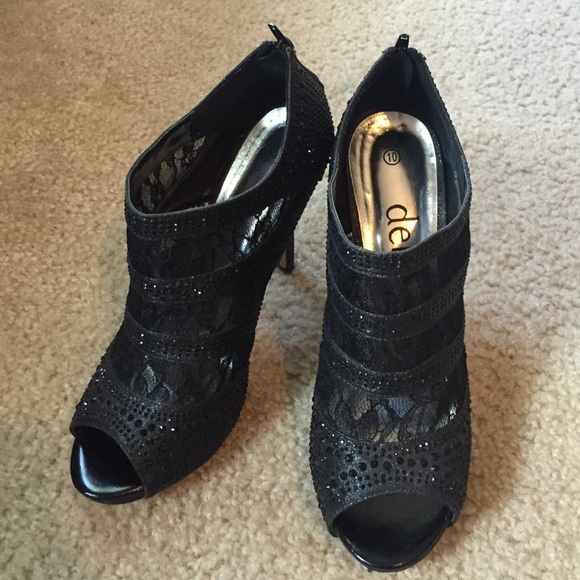 Lace black heels, size 10.