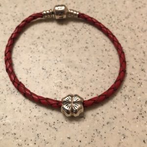 4 leaf clover pandora charm on red Pandora cord