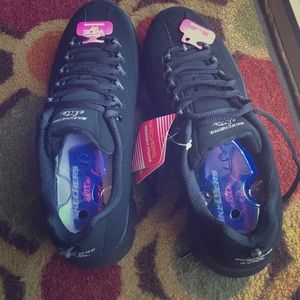 Black wide fit memory foam Skechers