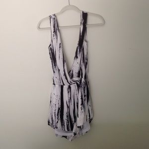 Low V front and back black and white romper