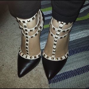 Studded black and nude pointy heels