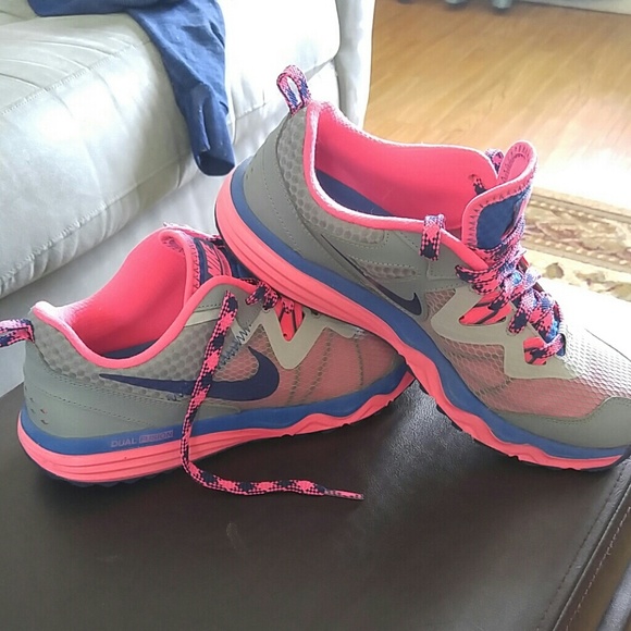 Nike blue pink and grey sneaker.