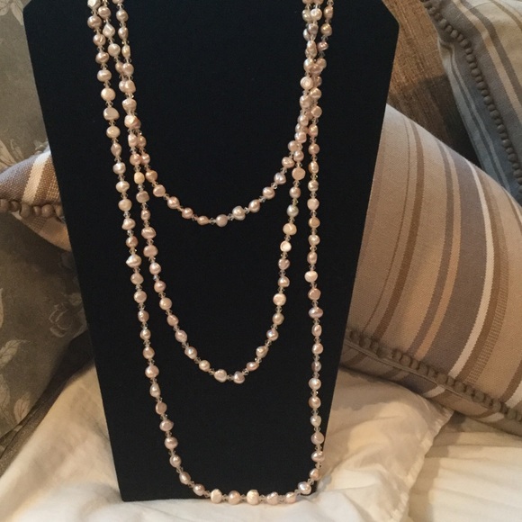 Very long pinkish fresh water pearl necklace