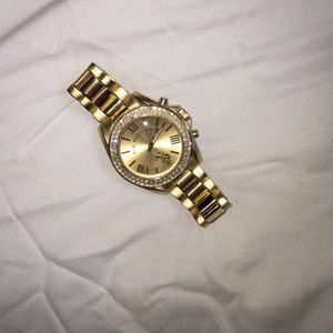 Gold polo watch