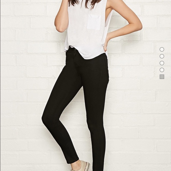 Skinny mid rise black jeans