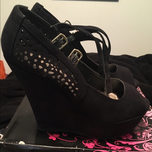 Black suede peek-toe wedges