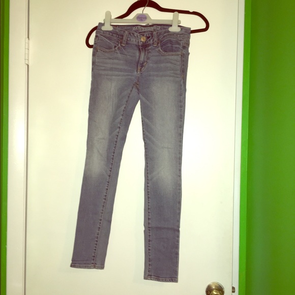 Distressed medium wash skinny jeans