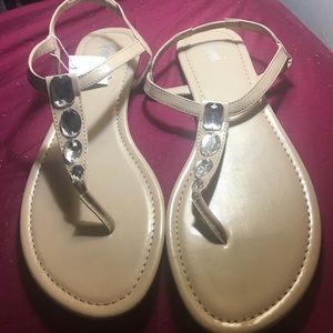 Beige sandals with gems