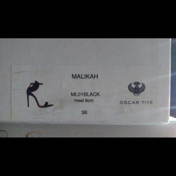 Beautiful Oscar Tiye shoes never worn!