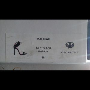 Beautiful Oscar Tiye shoes never worn!