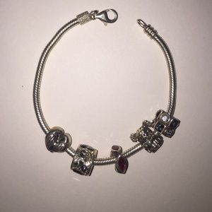 Pandora bracelet. 5 charms, charms additional