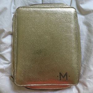 Monogrammed M jewelry case.