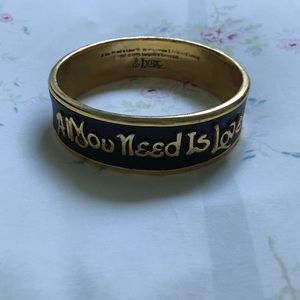 Trendy black leather and gold bracelet