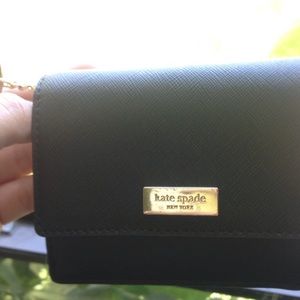 small black and gold Kate spade wallet