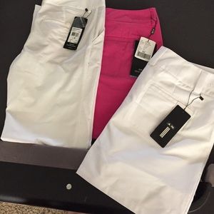2 ADIDAS GOLF SKIRTS AND WHITE ADIDAS PANTS