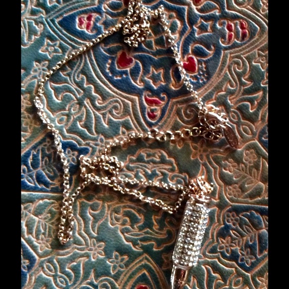 Rose colored bullet necklace