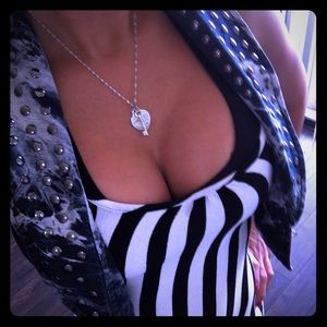 Super cute vest with metal emblems