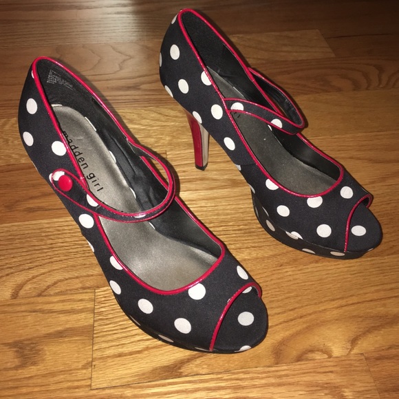 Black with white dots, some red edges